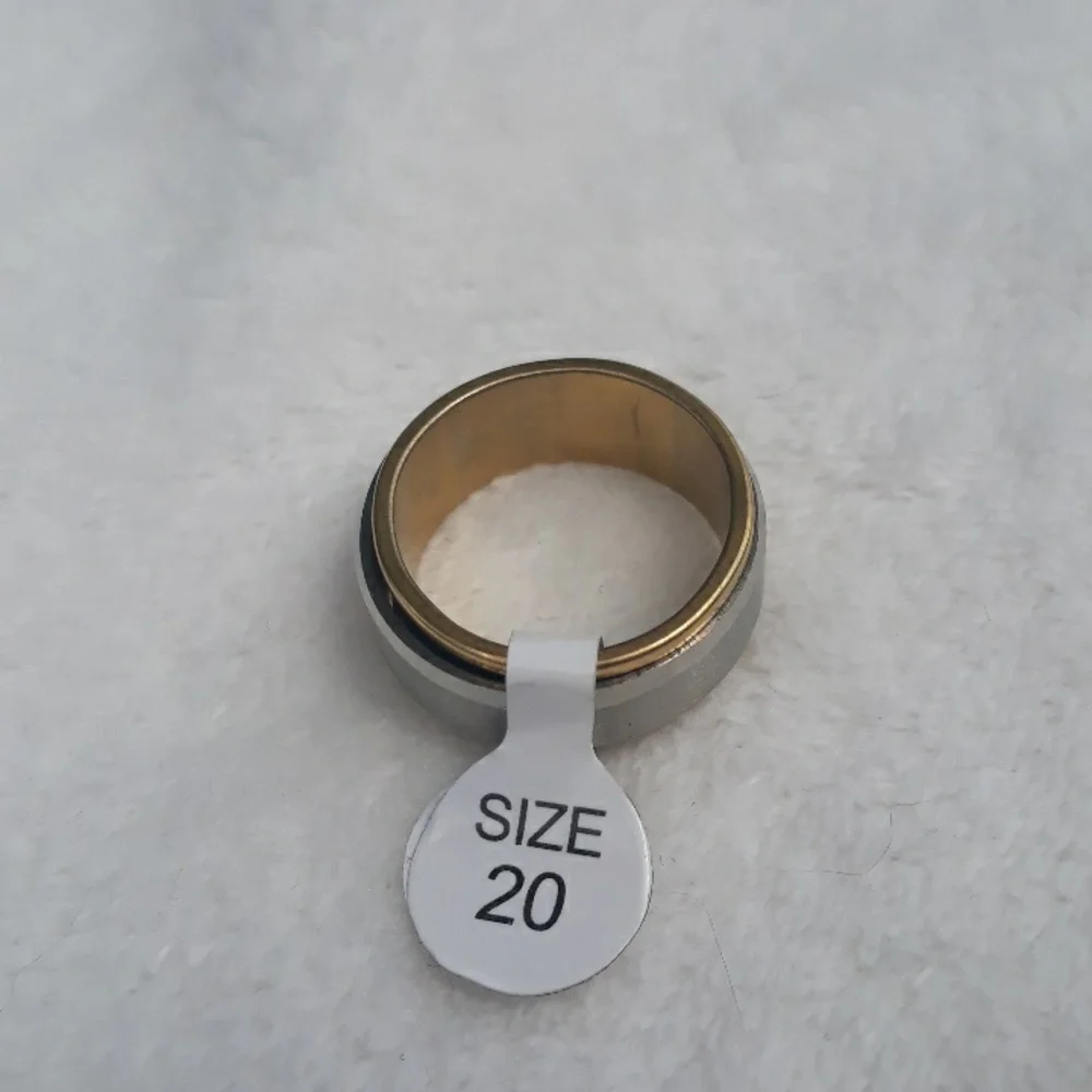 Gold and silver men's spinner ring. Size 10.5  or 19.6mm Great new condition